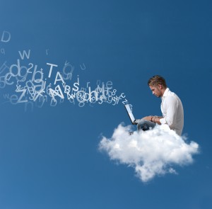 Businessman works over a cloud